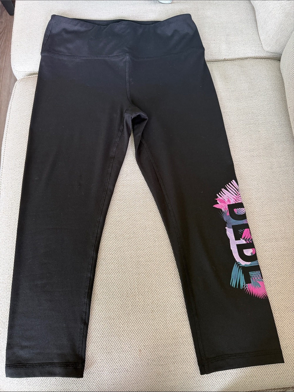 bebe Black Capri Leggings with Pink and Teal Side Graphic NWT